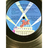 ELO A New World Record BPI Gold LP Award