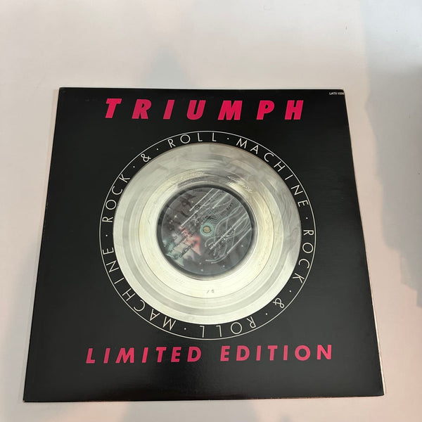 Triumph Rock & Roll Machine Import Limited Edition Silver Disc 1977 - Media