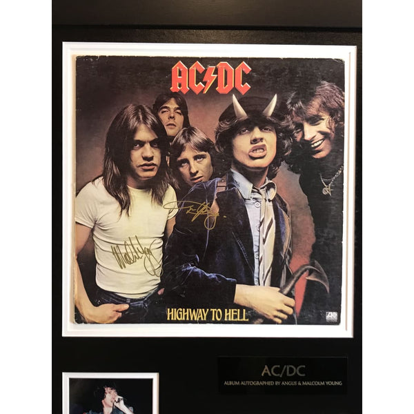 AC/DC album signed by Angus and Malcolm Young w/JSA LOA – MusicGoldmine.com