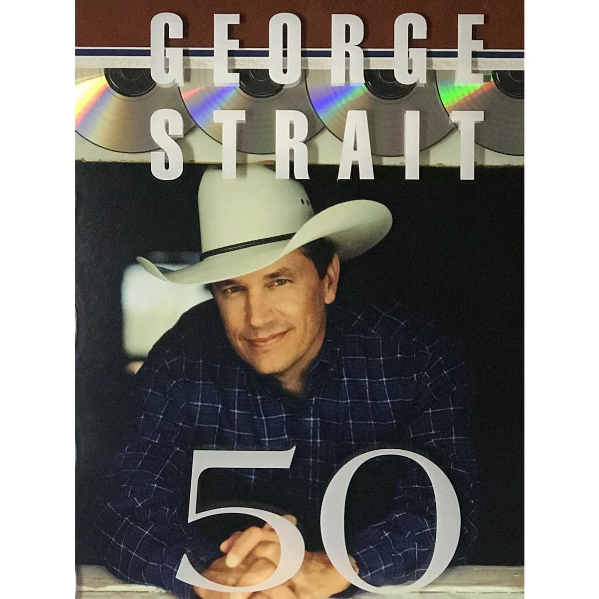George Strait 50x Platinum Label Award – MusicGoldmine.com